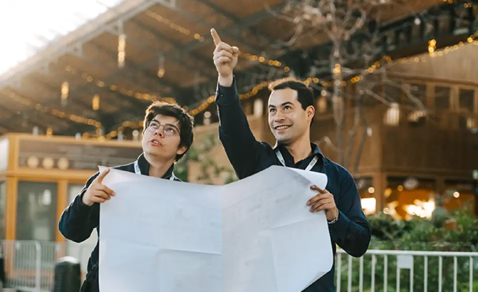 people holding a map - csr policy