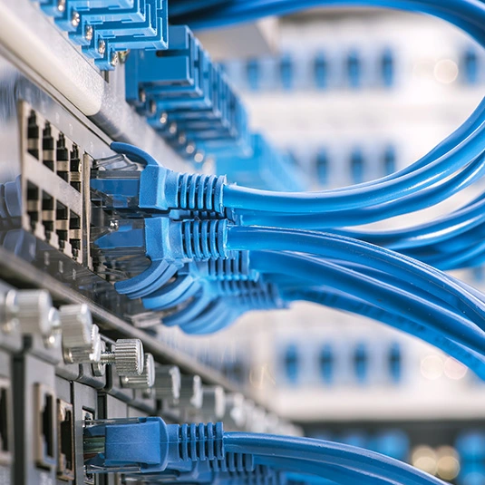 Ethernet cables connected to switch for high-performance private network